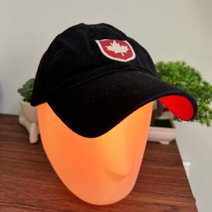 Red Canoe Black Cap with Red Canada Maple Leaf Shield Patch